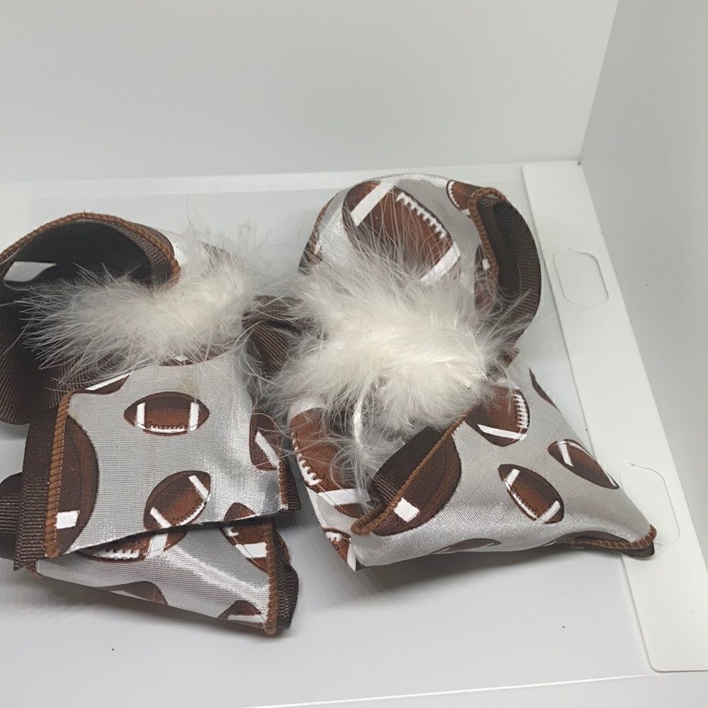 Girls large football hair bow